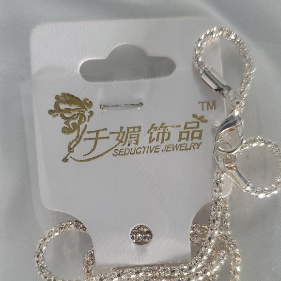 Sparkling Crystal Cat Pendant with Red Accents - Picture 3 of 7